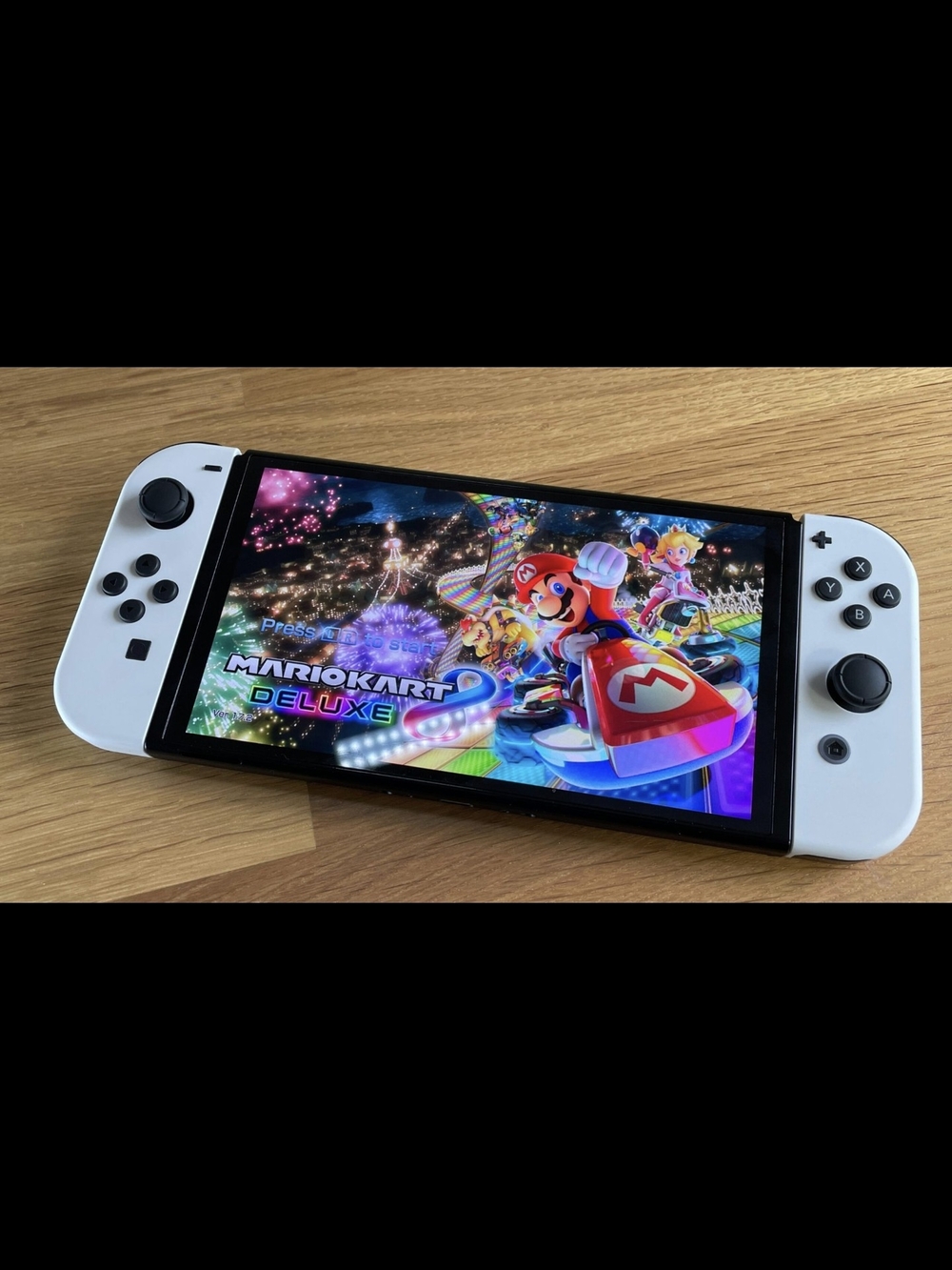 Nintendo Switch OLED Console with White Controllers